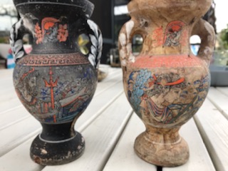 Image of two Grecian urns side by side