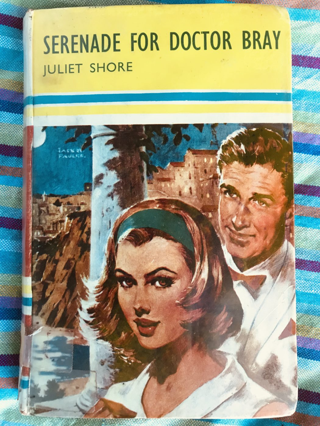 Illustrated book cover of Serenade for Doctor Bray with a woman facing the front and a man behind her 