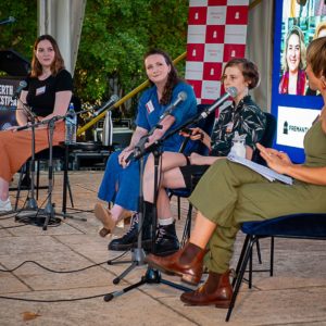 The social media panel of Bianca Breen, Kirsty Horton and Riley Benfell talking to Molly Schmidt on stage at Fremantle Arts Centre.